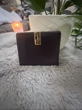 Vintage Gucci black leather wallet